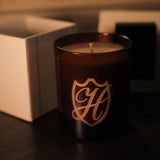 Candle with white box in the background