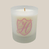 unlit spring candle in branded vessel